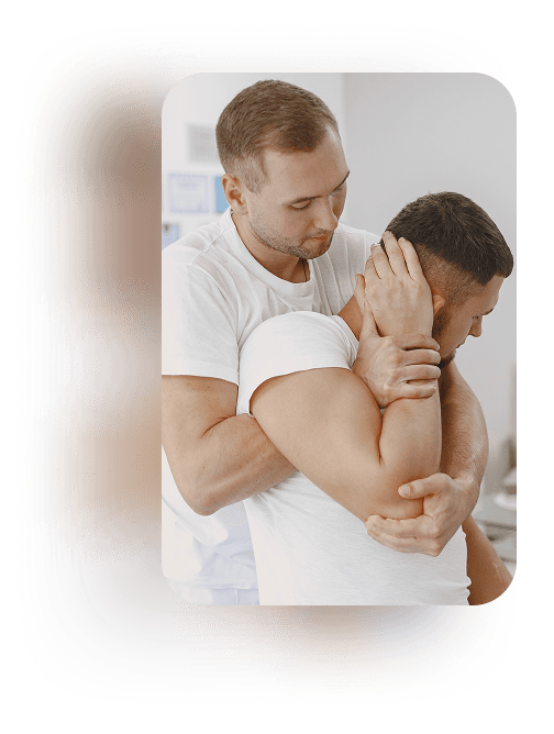 Physiotherapist treating a patient's neck.