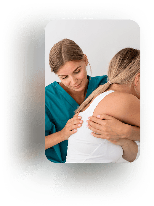 Physiotherapist treating a patient's back.